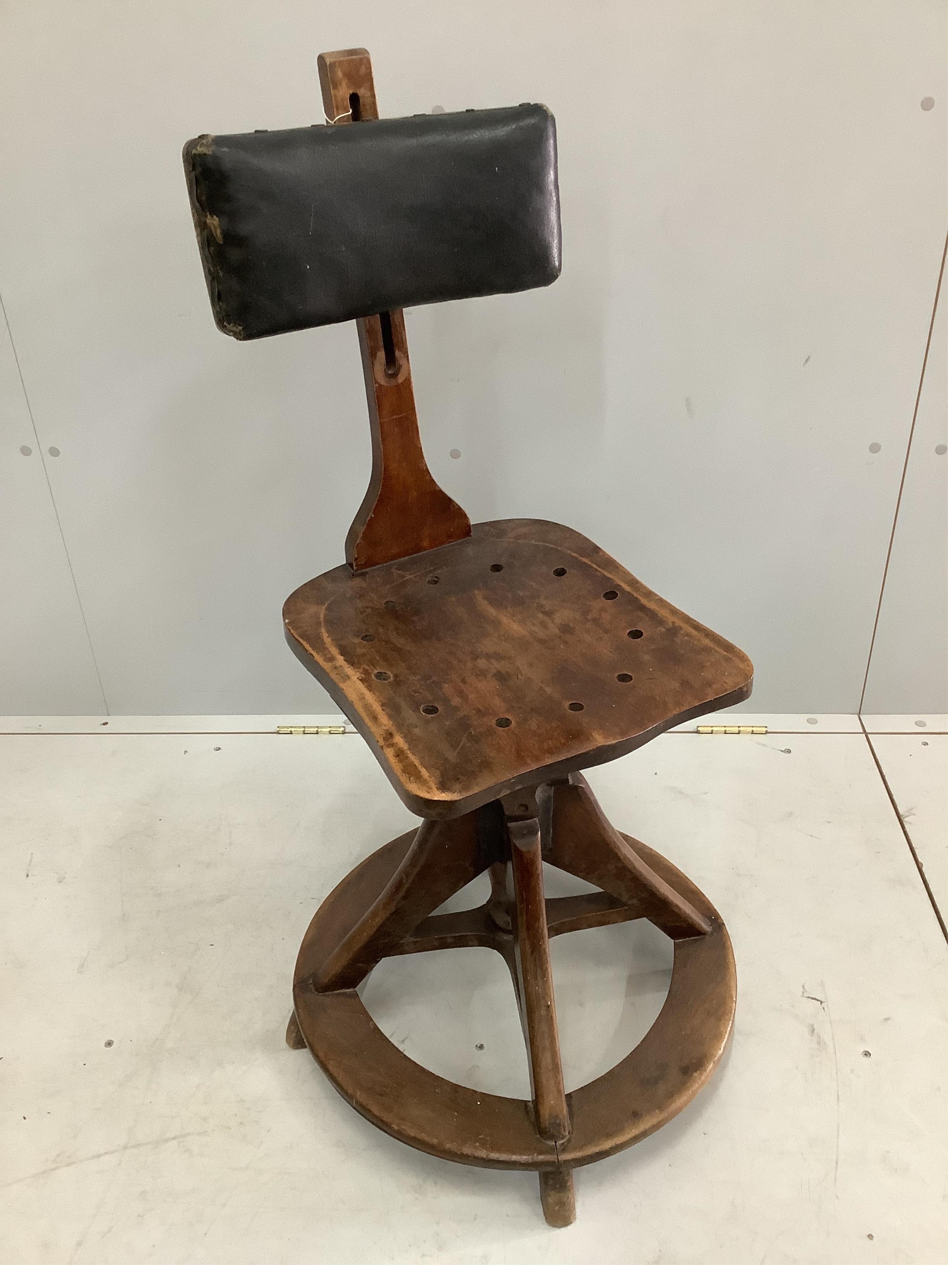 An early 20th century Glenister architect's or artist's adjustable chair, width 50cm, depth 50cm, height 100cm. Condition - fair